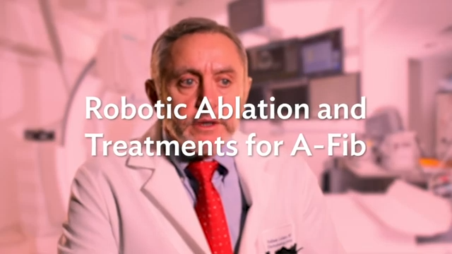 red graphic that reads Robotic Ablation and Treatments for A-Fib. The graphic is transparent and overlays a photo of the physician, a male with grey hair wearing a lab coat and a red neck tie