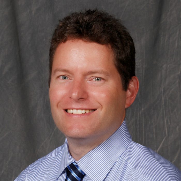 Director Dr. Justin Szawlewicz