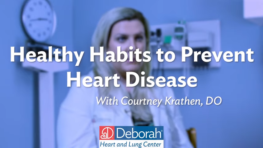 blue graphic that reads healthy habits to prevent heart disease with Courtney Krathen, DO. The Deborah Heart and Lung Center logo appears at the bottom. The graphic is transparent and overlays an image of the physician, a female with long blonde hair who is wearing a lab coat