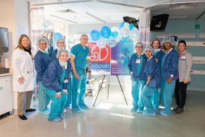 Shown is Dr. Raffaele Corbisiero (fifth from left) with the surgical team at Deborah Heart and Lung Center after a procedure to implant the Abbott AVEIR™ DR dual chamber leadless pacemaker.