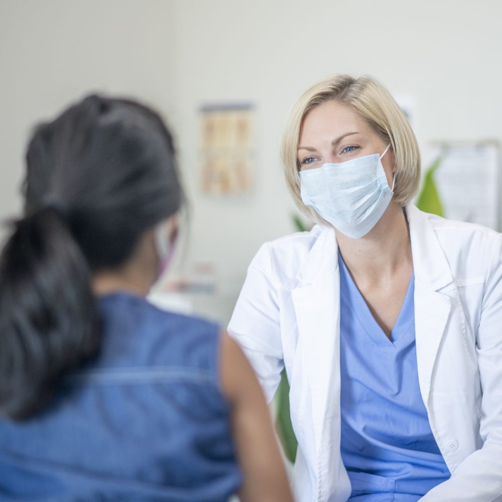 Female patient and physician