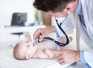 That Tickels! Baby getting checked out by male doctor with stethoscope
