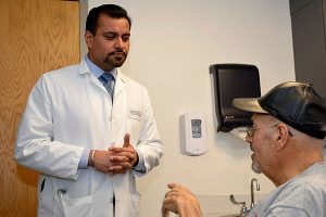 Dr Barn with Patient