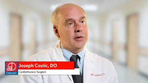 image of a white male physician wearing a lab coat