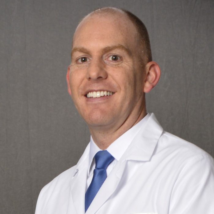 male physician in lab coat