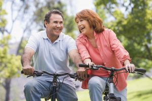 Couple riding bikes