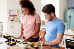 Couple preparing meals