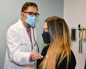 Dr Kahn treating patient