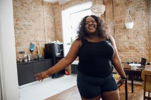 Woman showing off her flat