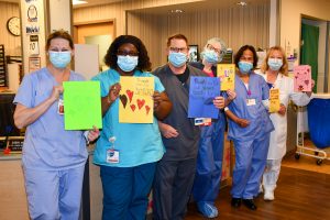 People Holding Thank You Cards