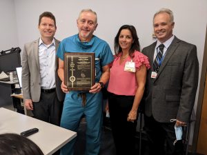 Dr. Corbisiero receives patent plaque