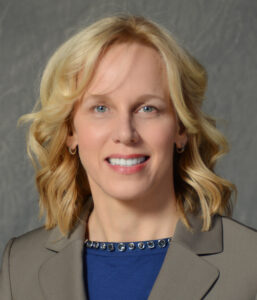 smiling woman with blonde hair