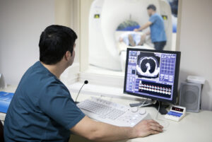 Radiologist reading a CAT scan