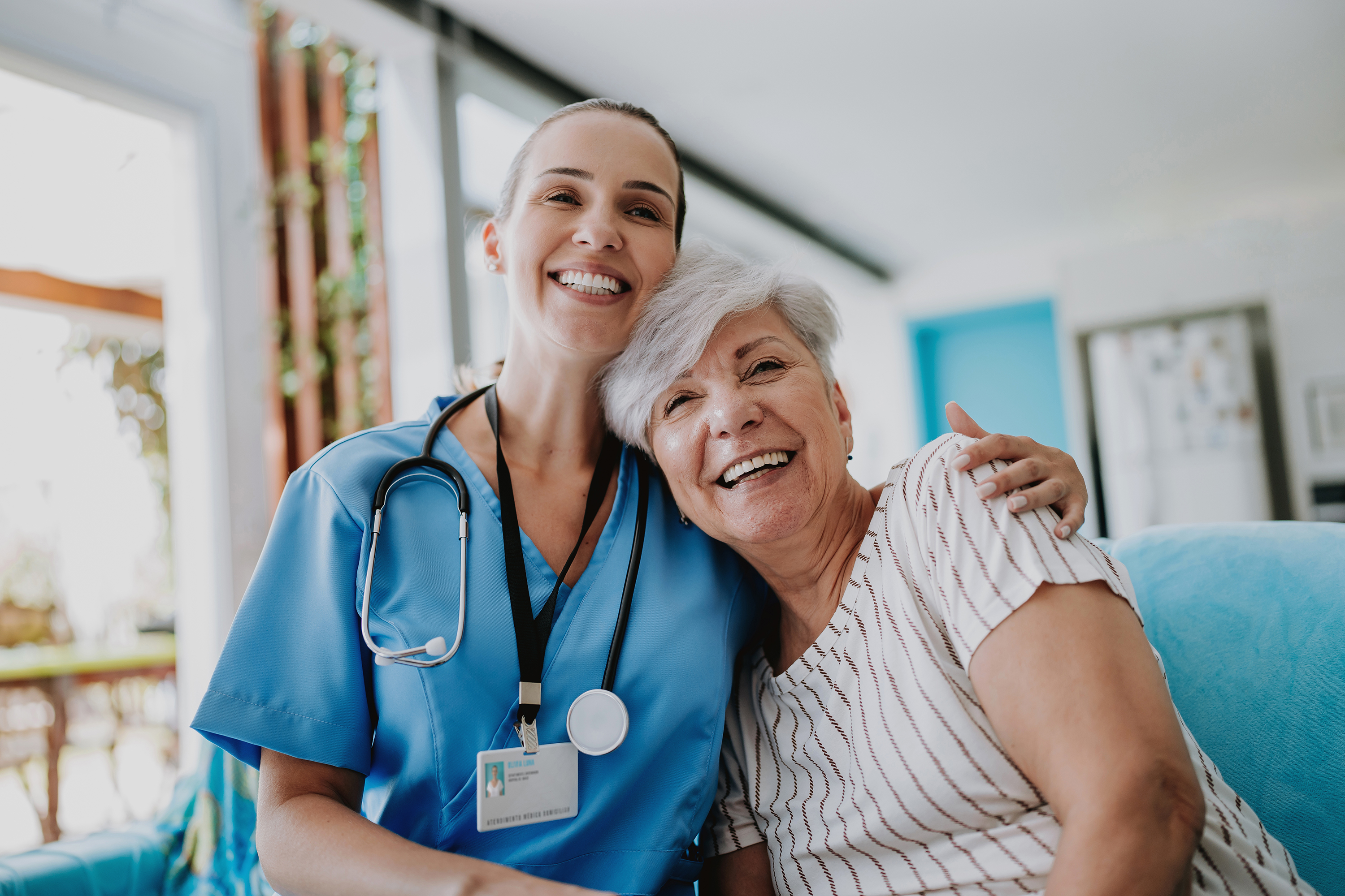 doctor and patient smiling and embracingd